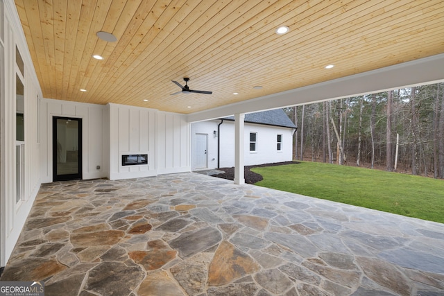 view of patio featuring ceiling fan