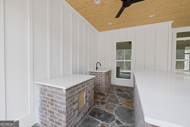 interior space featuring a ceiling fan