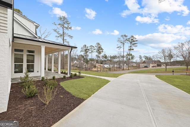 exterior space with a lawn