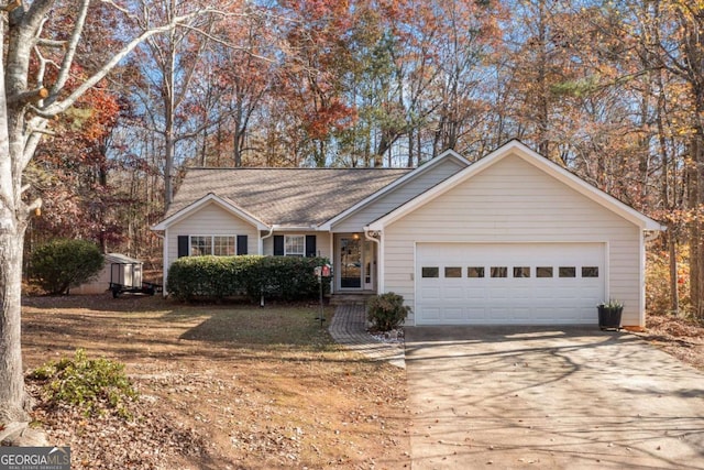 ranch-style home featuring a garage