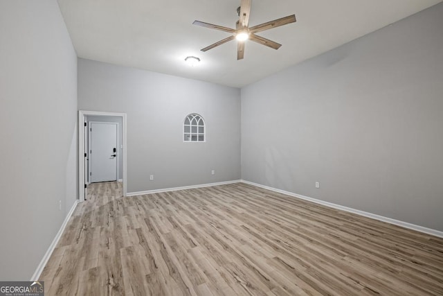 unfurnished room featuring ceiling fan and light wood-type flooring