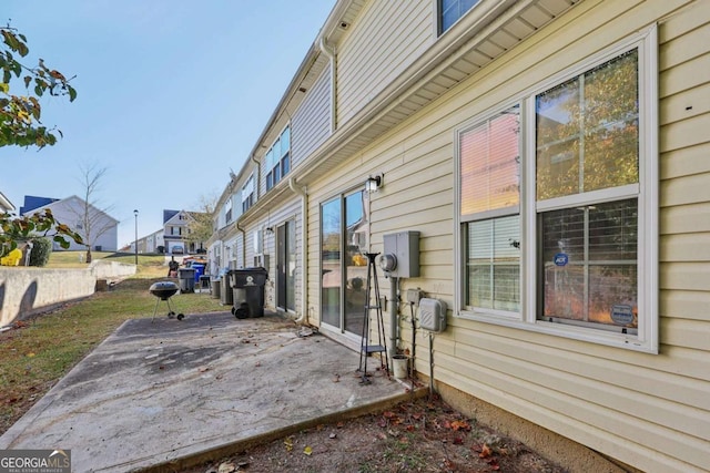 view of home's exterior with a patio area