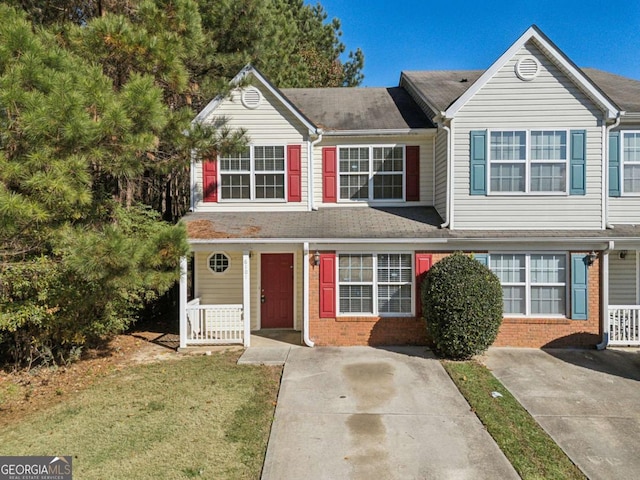 view of property with covered porch