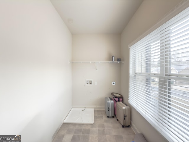 washroom featuring hookup for a washing machine and electric dryer hookup