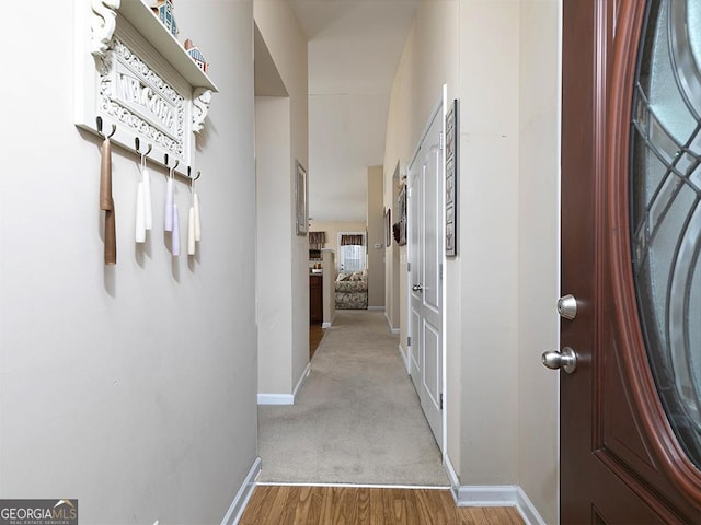 hallway featuring light hardwood / wood-style flooring