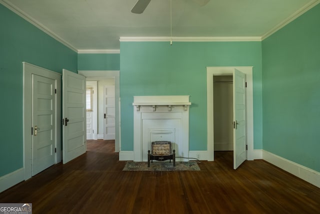 unfurnished living room featuring crown molding, ceiling fan, and dark wood-type flooring