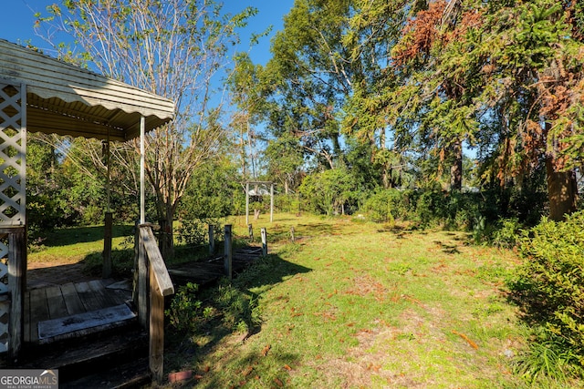 view of yard featuring a deck