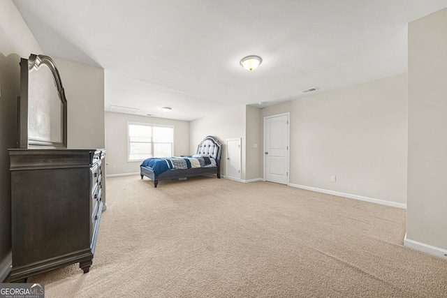 bedroom with light carpet, baseboards, and visible vents