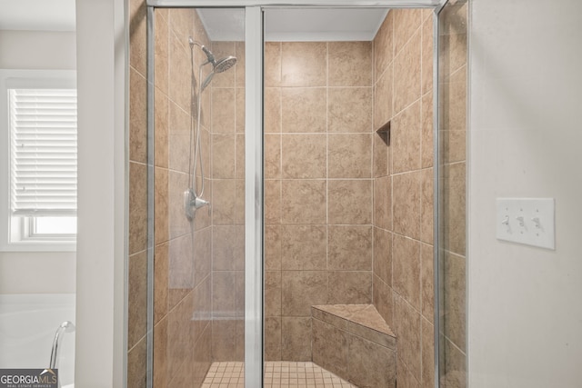 full bathroom with a stall shower