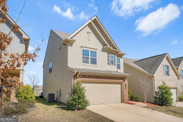 view of front of home with a garage, driveway, brick siding, and central air condition unit