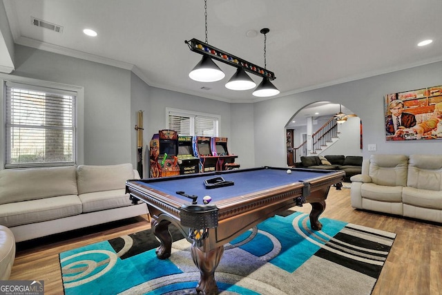 rec room featuring light hardwood / wood-style floors, ornamental molding, and billiards