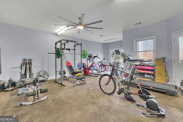 exercise room featuring ceiling fan