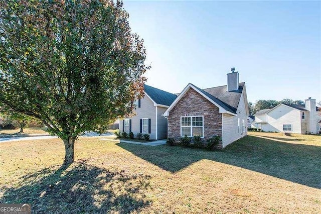 view of front of home with a front yard