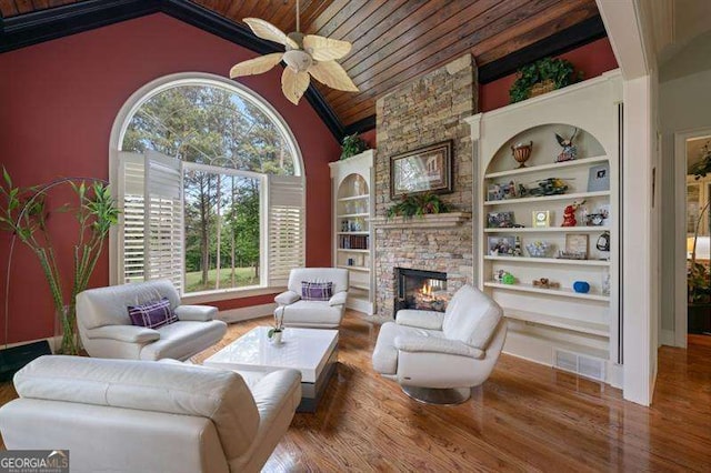 living room with ceiling fan, wooden ceiling, vaulted ceiling, and wood-type flooring