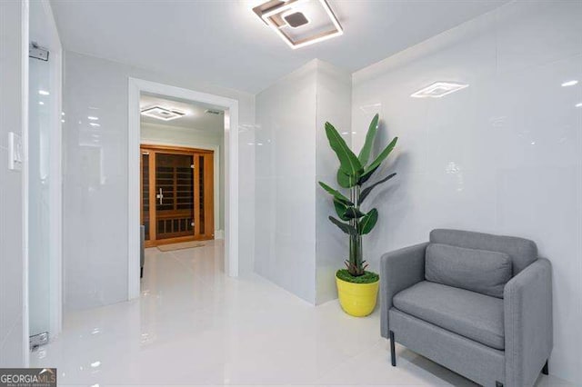 corridor with light tile patterned flooring