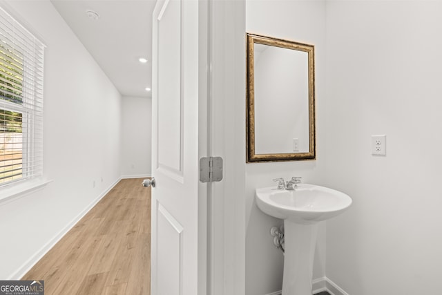 bathroom featuring hardwood / wood-style flooring