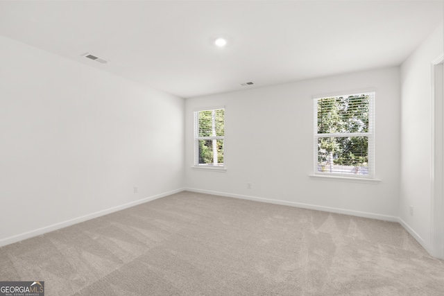 empty room with light carpet