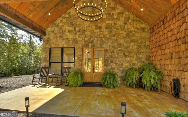 view of exterior entry featuring french doors