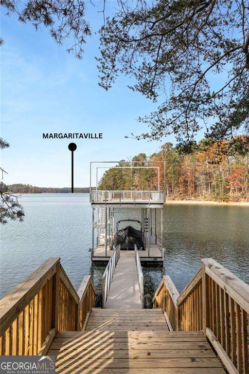 view of dock with a water view