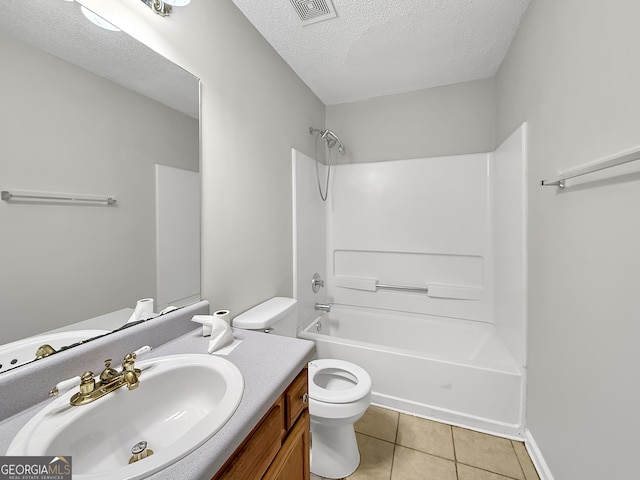 full bathroom with tile patterned flooring, bathing tub / shower combination, a textured ceiling, toilet, and vanity