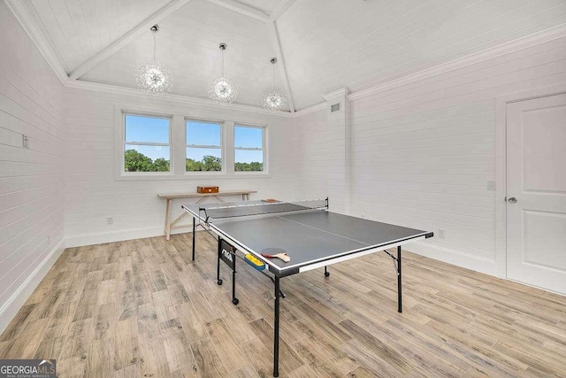 rec room featuring a chandelier, crown molding, high vaulted ceiling, and light hardwood / wood-style floors