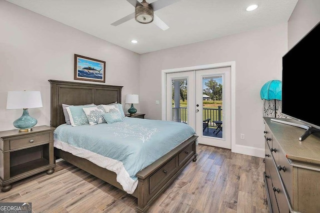 bedroom with access to outside, ceiling fan, french doors, and light wood-type flooring