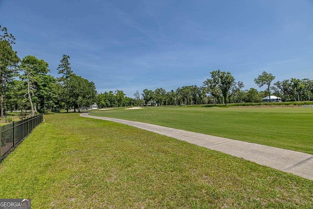 view of community featuring a lawn