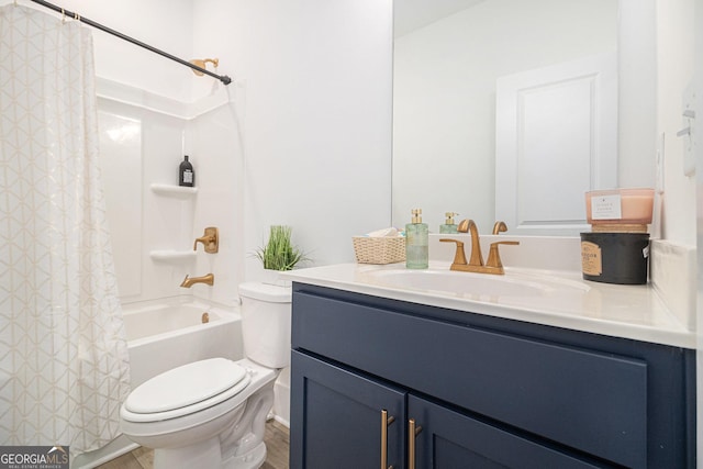 full bathroom with vanity, shower / bath combination with curtain, and toilet