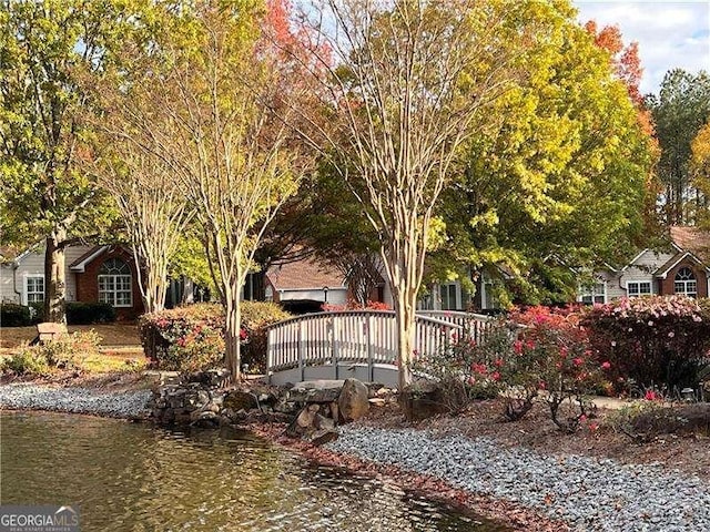 view of property's community with a water view