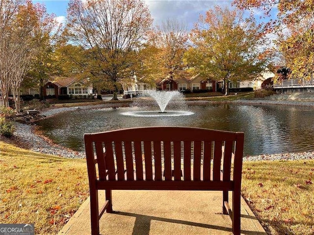 view of property's community with a water view