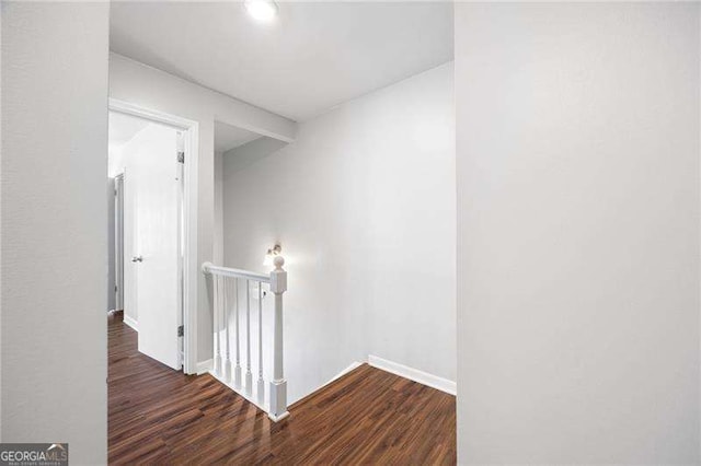 hall with dark hardwood / wood-style floors