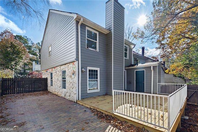 rear view of house with a patio