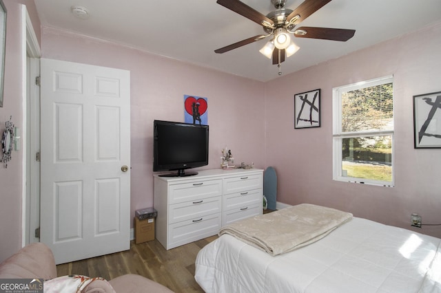 bedroom featuring ceiling fan and light wood-type flooring