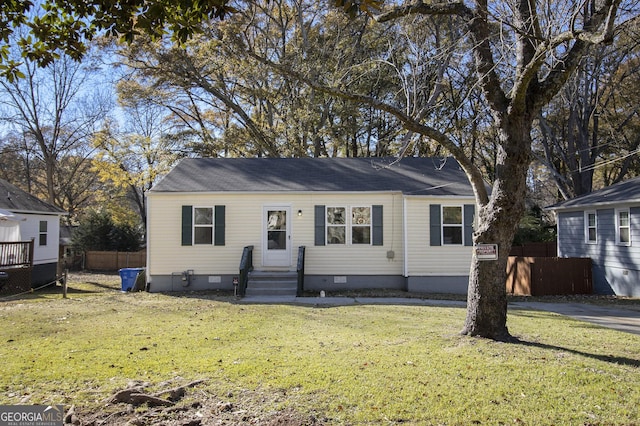 view of front of house with a front lawn