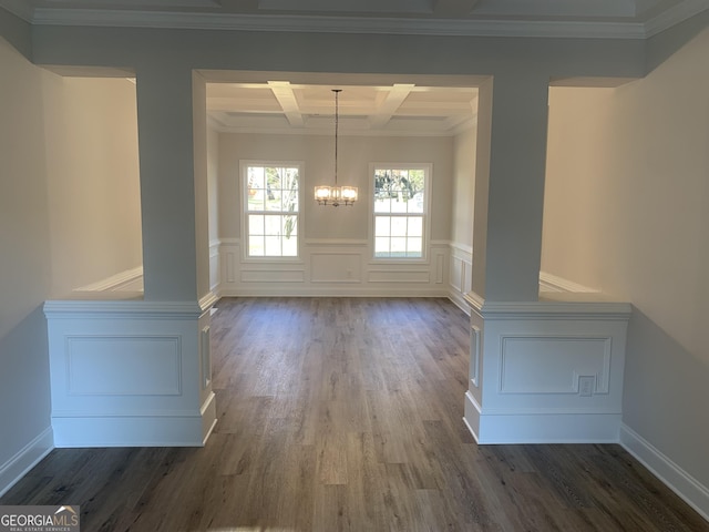 unfurnished dining area with beamed ceiling, crown molding, coffered ceiling, and dark wood-type flooring