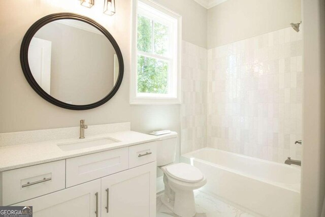 full bathroom featuring vanity, toilet, and shower / tub combination