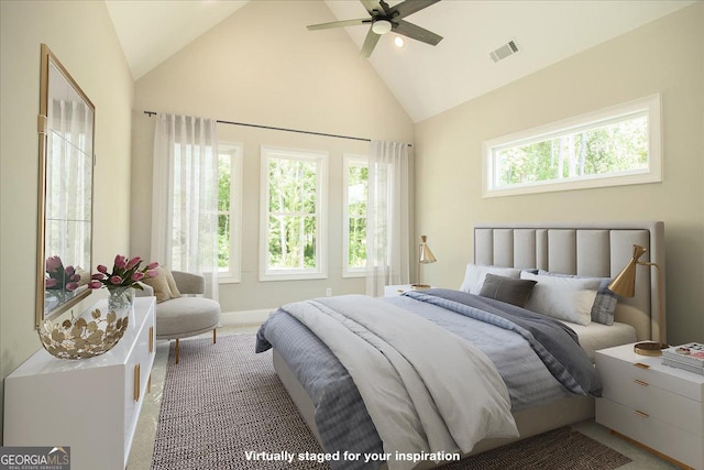 bedroom featuring ceiling fan and vaulted ceiling