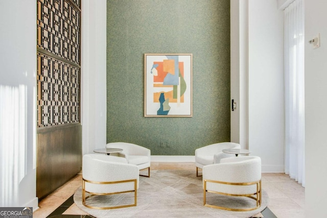 living area featuring light tile patterned flooring