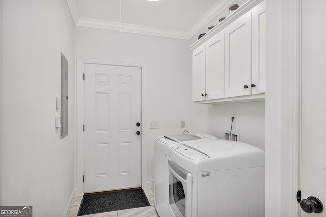 laundry area with cabinets, independent washer and dryer, electric panel, and crown molding