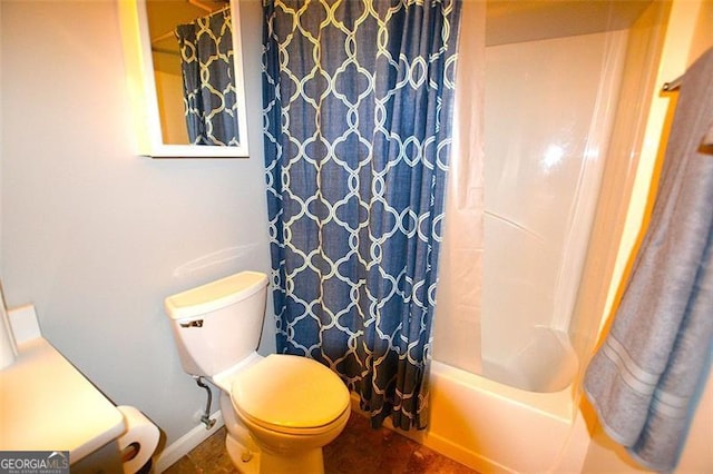 bathroom with toilet and shower / bath combo with shower curtain