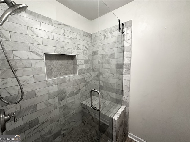 bathroom featuring walk in shower