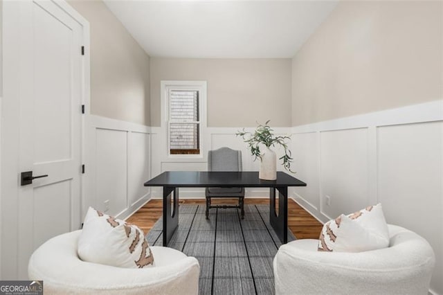 home office with hardwood / wood-style floors