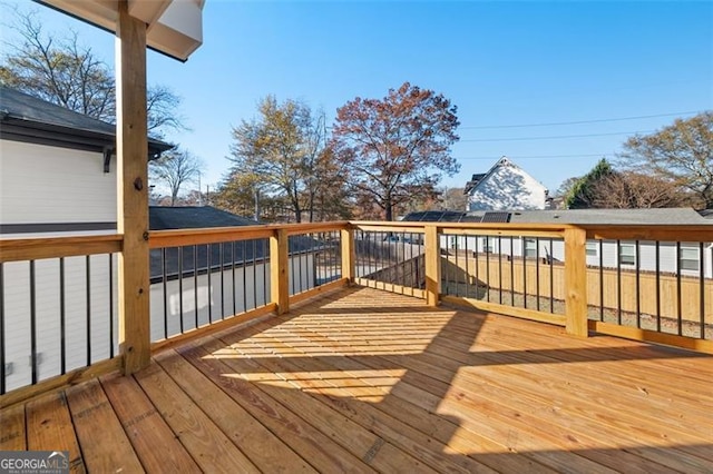 wooden terrace with a mountain view