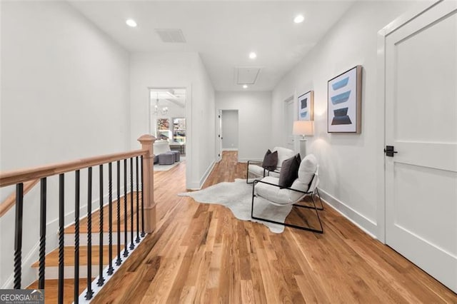 hall with light hardwood / wood-style flooring