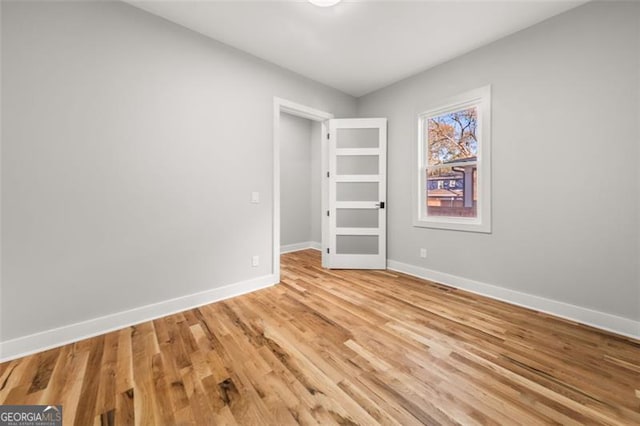 unfurnished bedroom with light hardwood / wood-style flooring