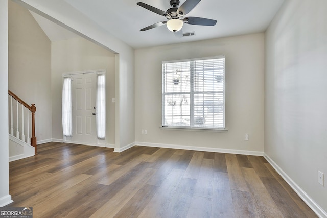 foyer featuring hardwood / wood-style flooring and ceiling fan