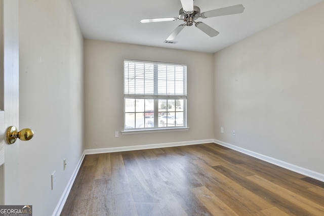 unfurnished room featuring ceiling fan and hardwood / wood-style floors