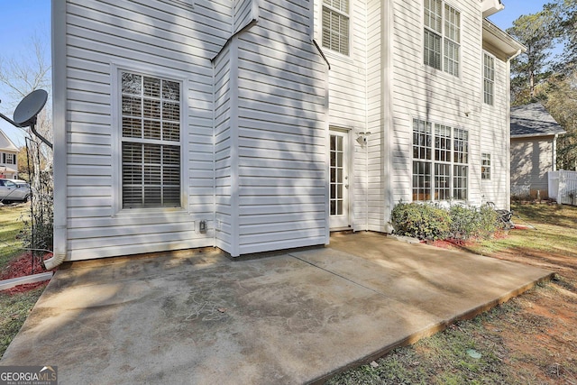 rear view of property featuring a patio area