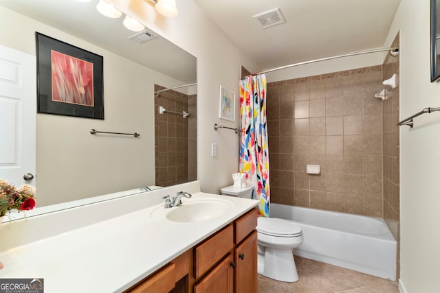 full bathroom featuring tile patterned floors, vanity, shower / tub combo, and toilet