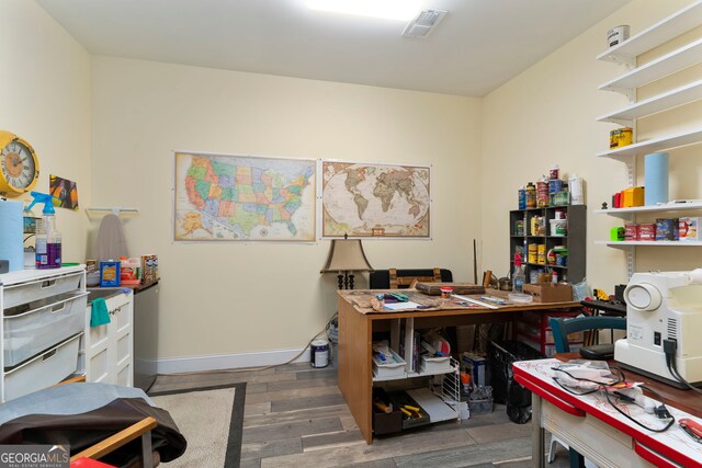 office space featuring dark hardwood / wood-style flooring